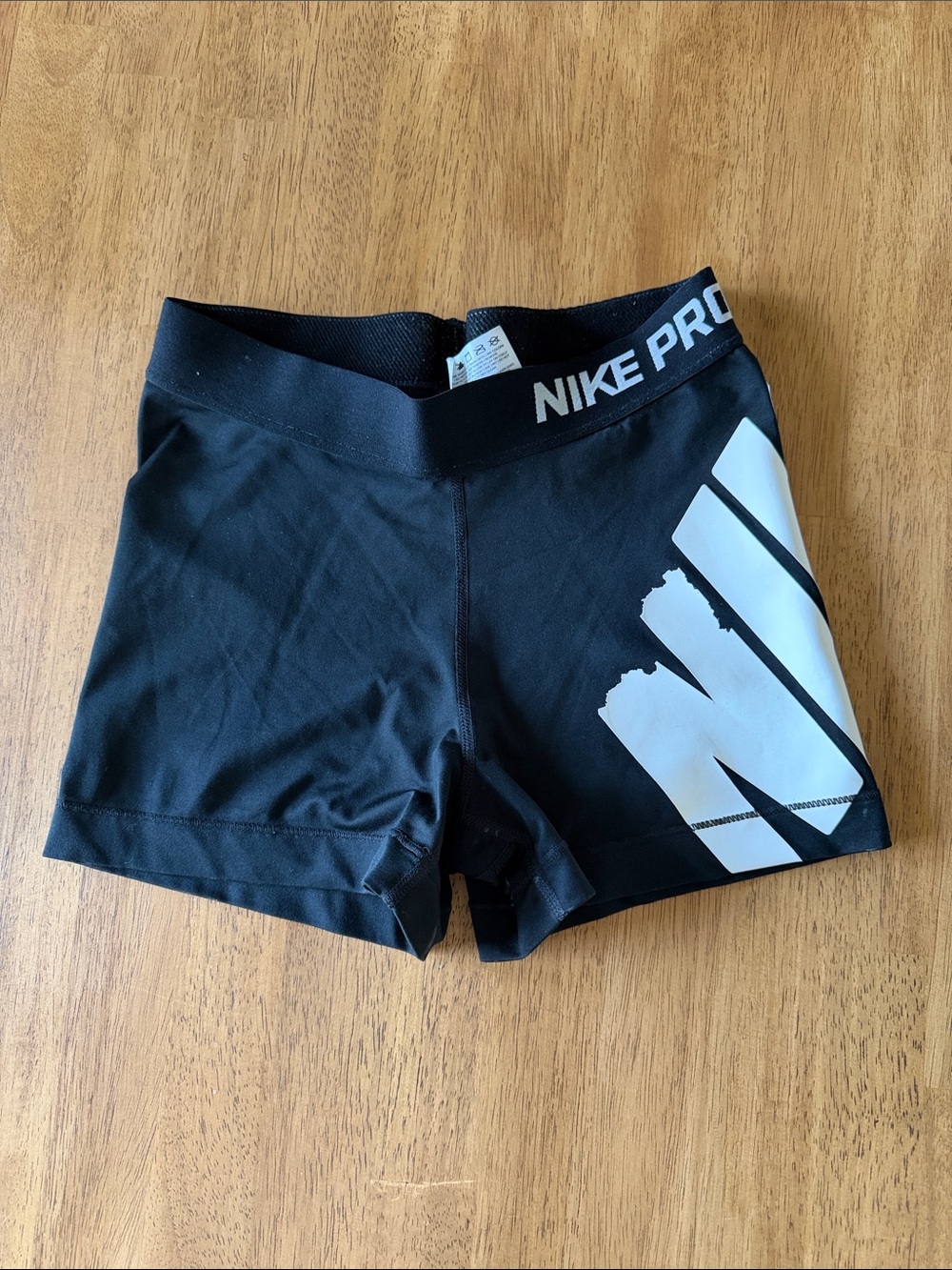 Nike Women's Black Athletic Compression Shorts with White Logo